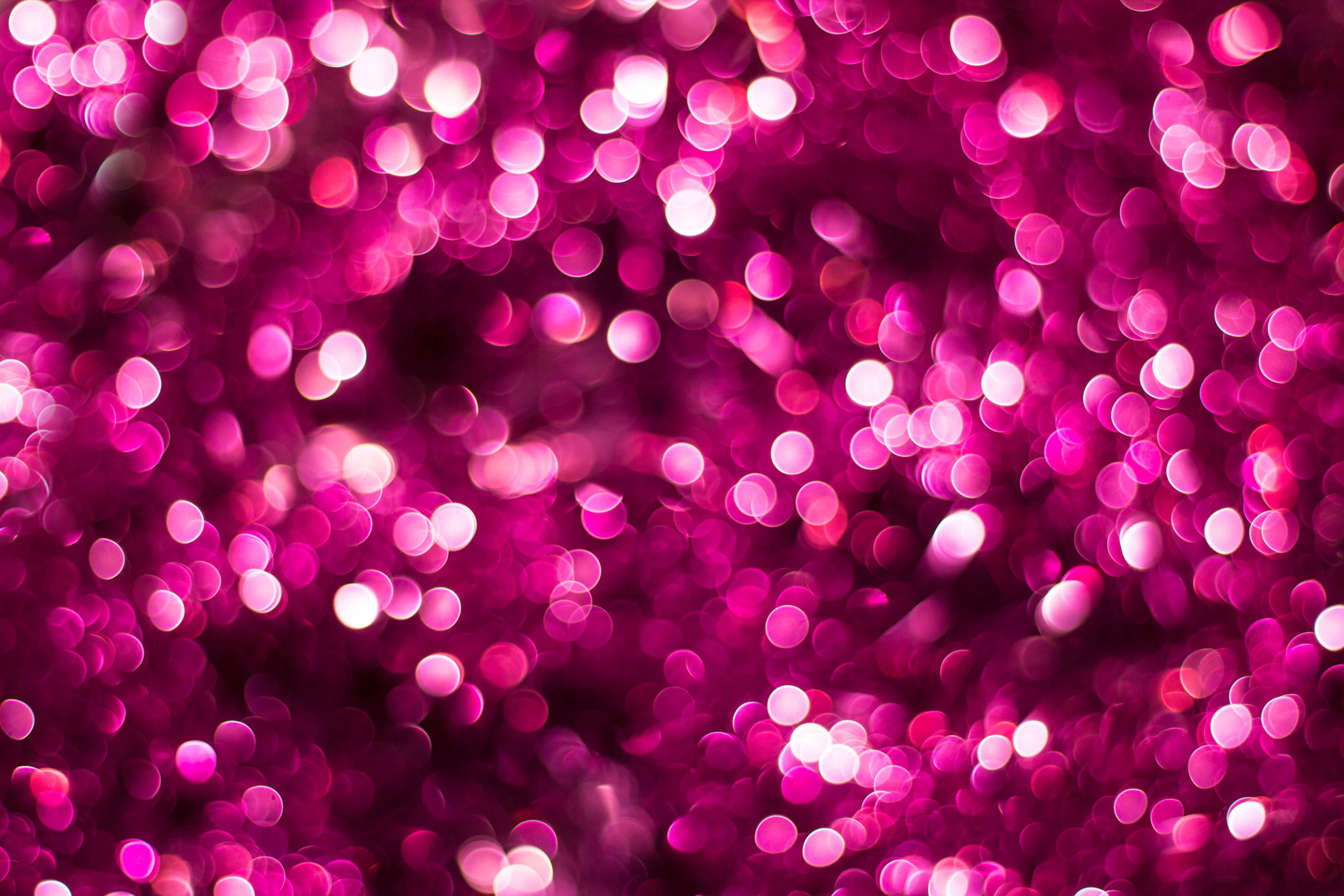 Красивый розовый фон для Фотошопа с красными и фиолетовыми светящимися кружками.